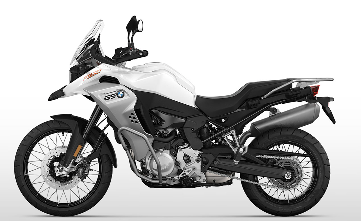 Et billede, der indeholder motorcykel, parkeret, udendørs, motorcykling
Automatisk genereret beskrivelse