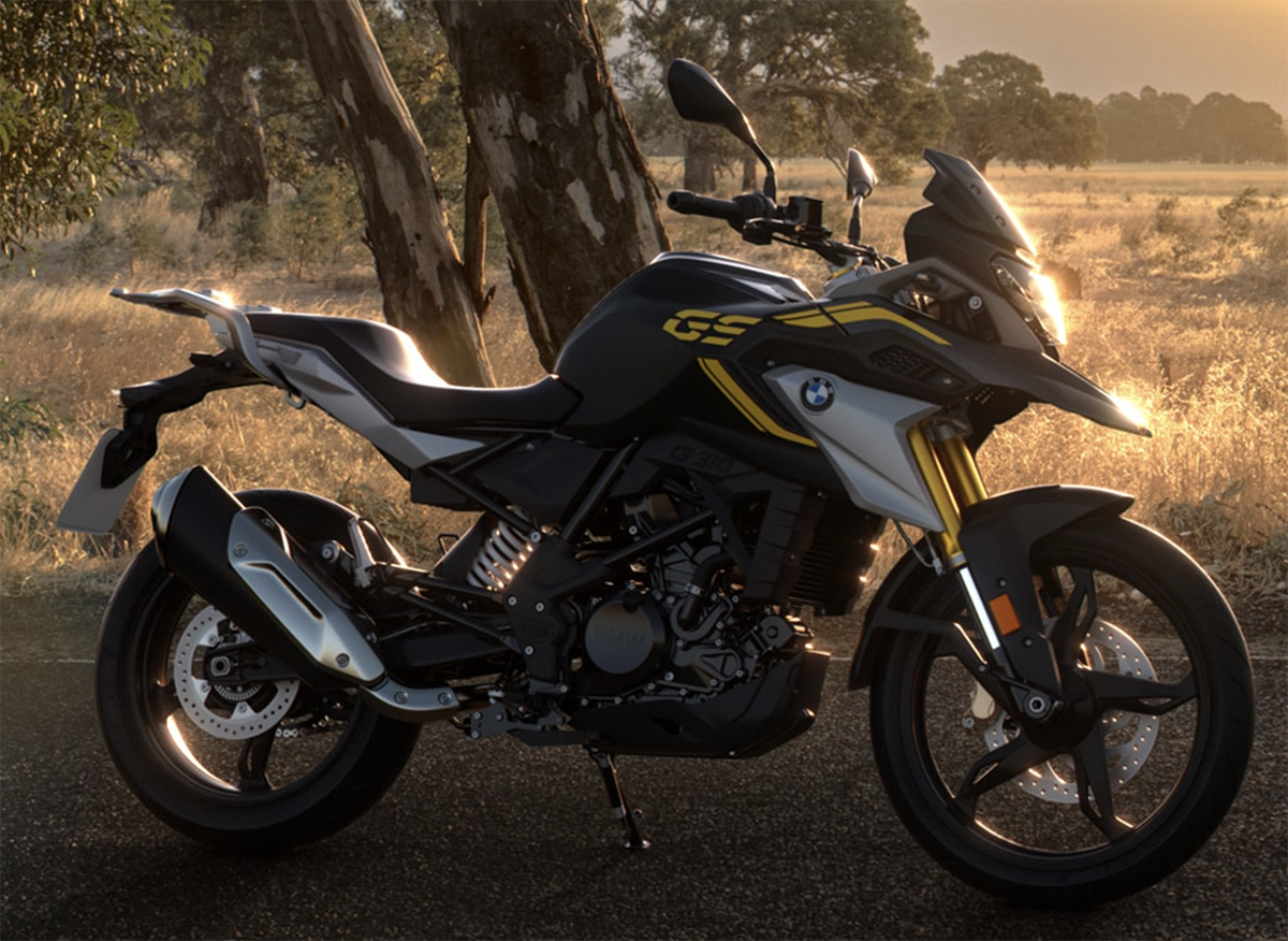 Et billede, der indeholder motorcykel, udendørs, parkeret, træ
Automatisk genereret beskrivelse