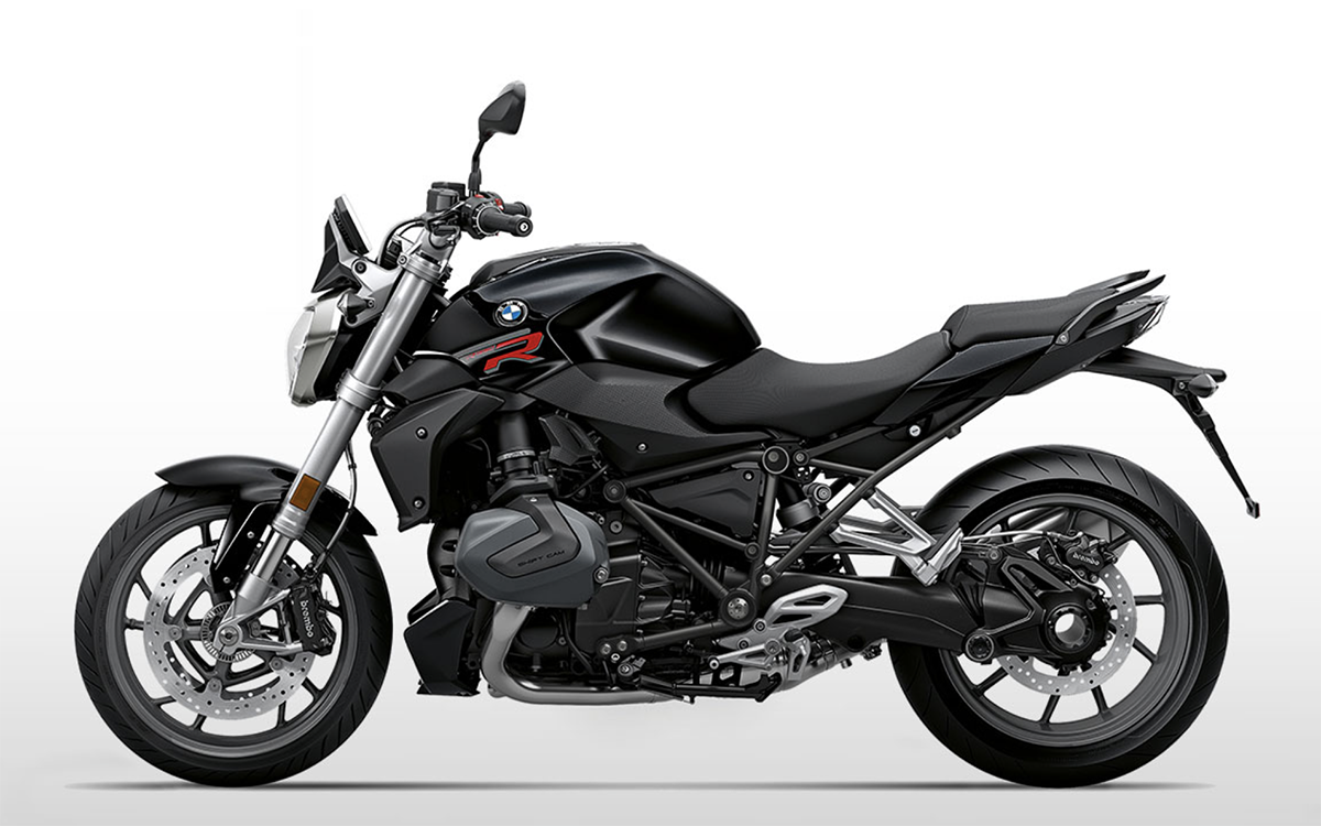 Et billede, der indeholder motorcykel, parkeret, udendørs, vej
Automatisk genereret beskrivelse