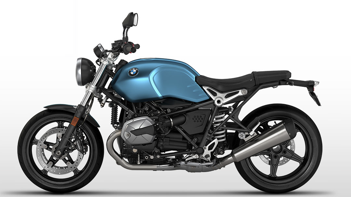 Et billede, der indeholder motorcykel, vej, udendørs, parkeret
Automatisk genereret beskrivelse