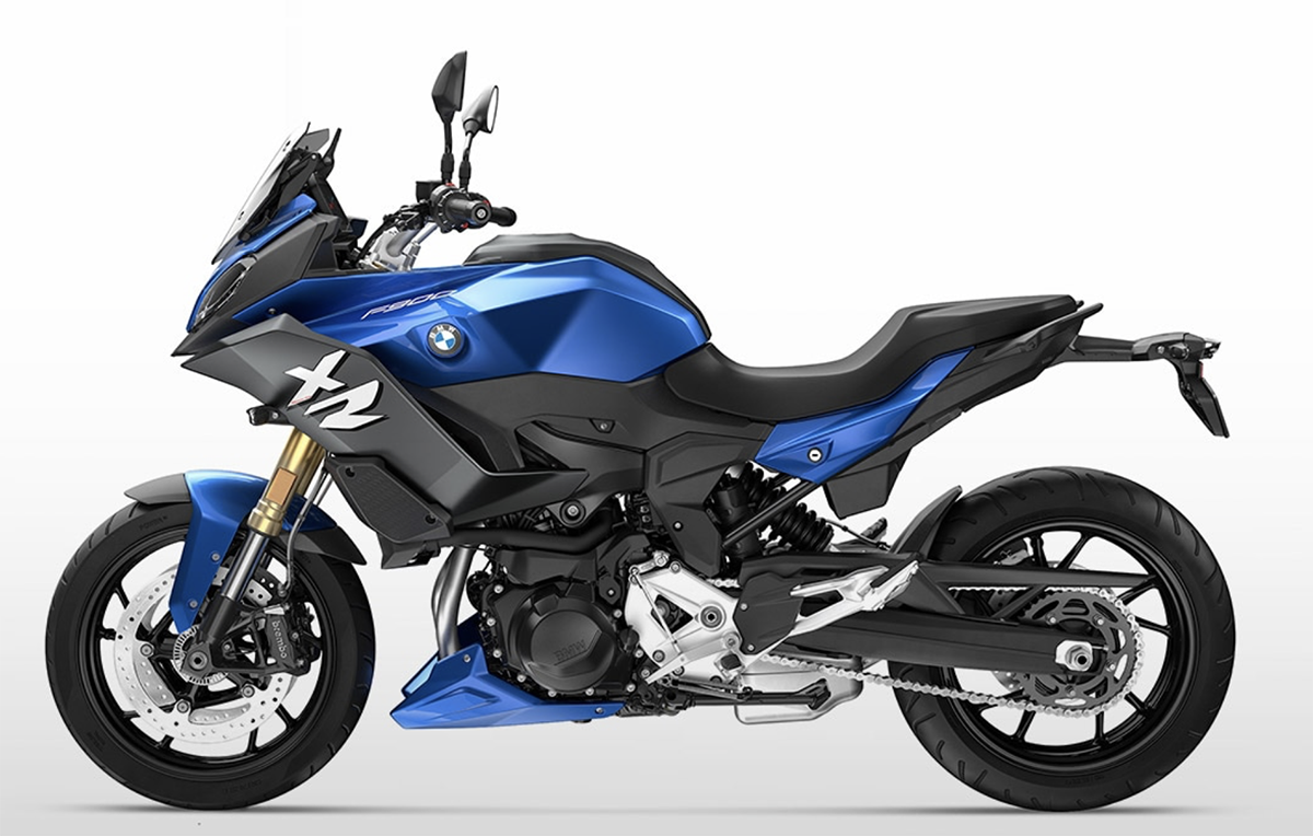 Et billede, der indeholder motorcykel, parkeret, blå
Automatisk genereret beskrivelse