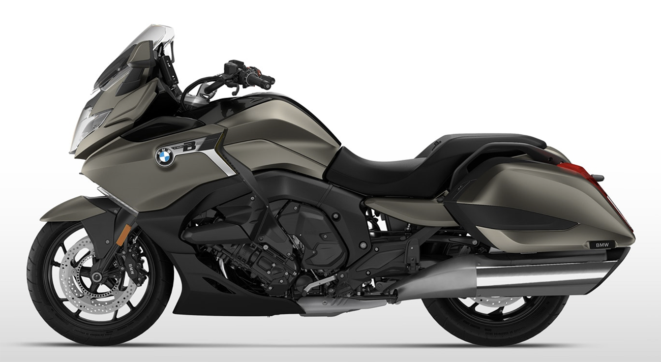 Et billede, der indeholder motorcykel, udendørs, vej, parkeret
Automatisk genereret beskrivelse