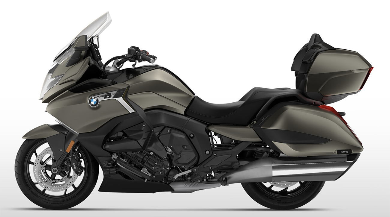 Et billede, der indeholder motorcykel, udendørs, vej, parkeret
Automatisk genereret beskrivelse