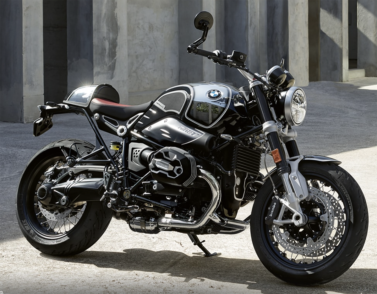 Et billede, der indeholder motorcykel, udendørs, bygning, vej
Automatisk genereret beskrivelse