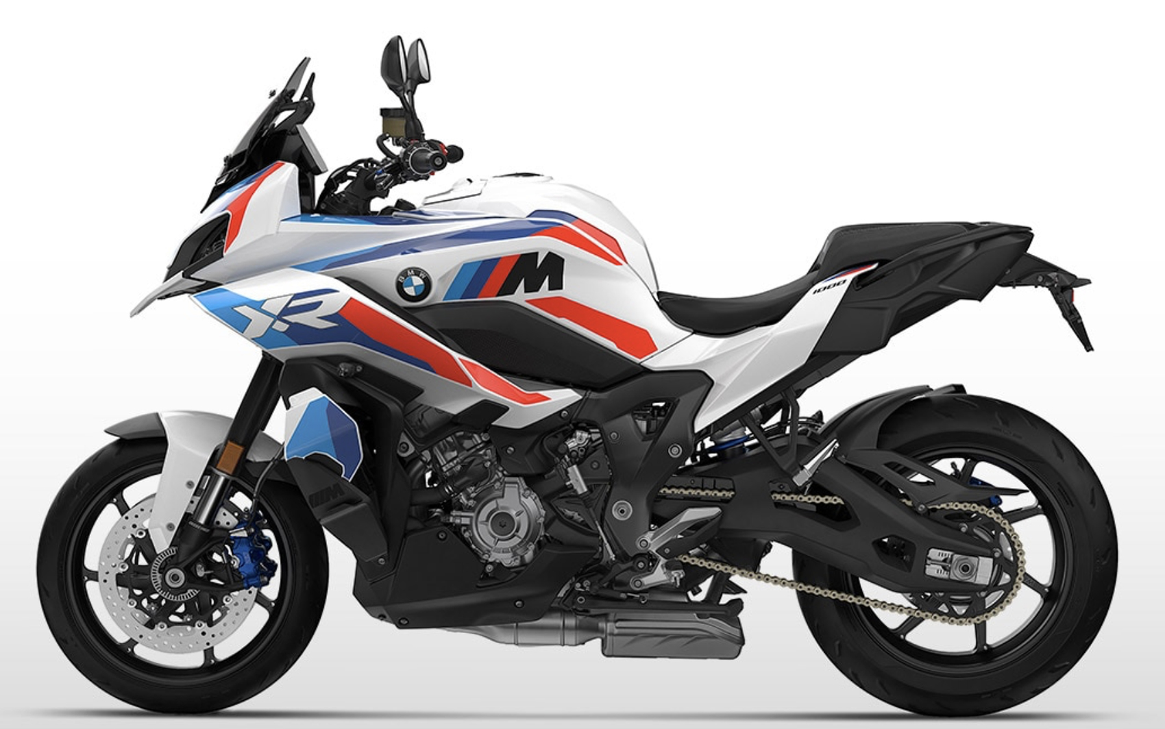 Et billede, der indeholder dæk, hjul, køretøj, motorcykel
Automatisk genereret beskrivelse