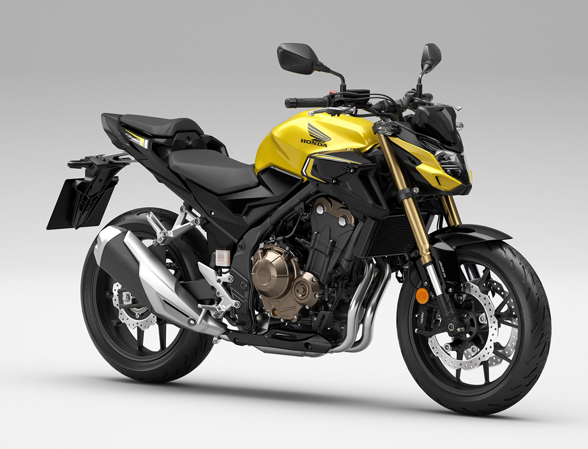 Et billede, der indeholder motorcykel, vej, udendørs, gul
Automatisk genereret beskrivelse