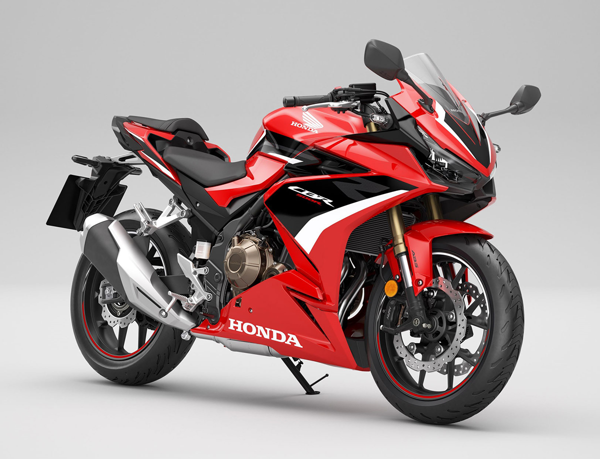 Et billede, der indeholder motorcykel, vej, r�d

Automatisk genereret beskrivelse