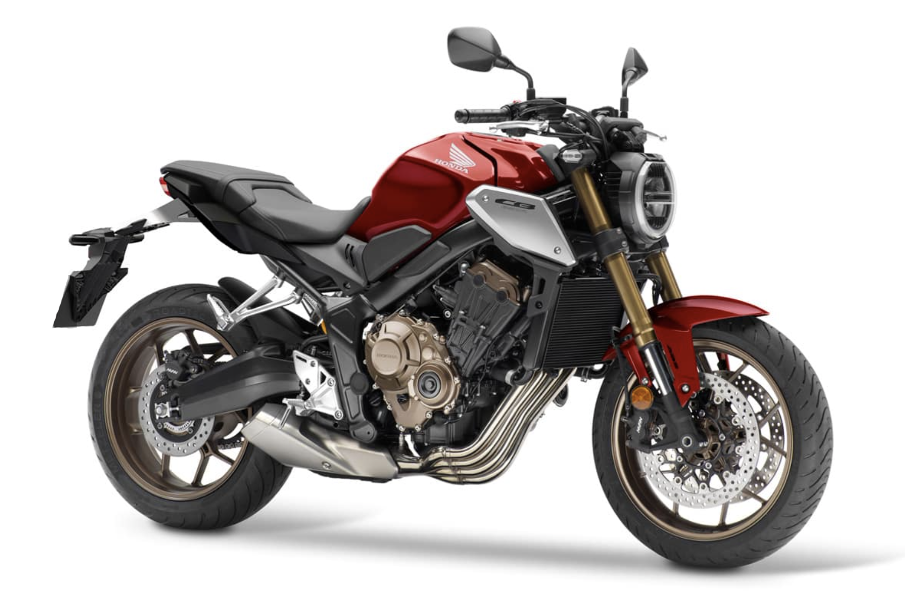 Et billede, der indeholder motorcykel, udendørs, parkeret, motorcykling
Automatisk genereret beskrivelse