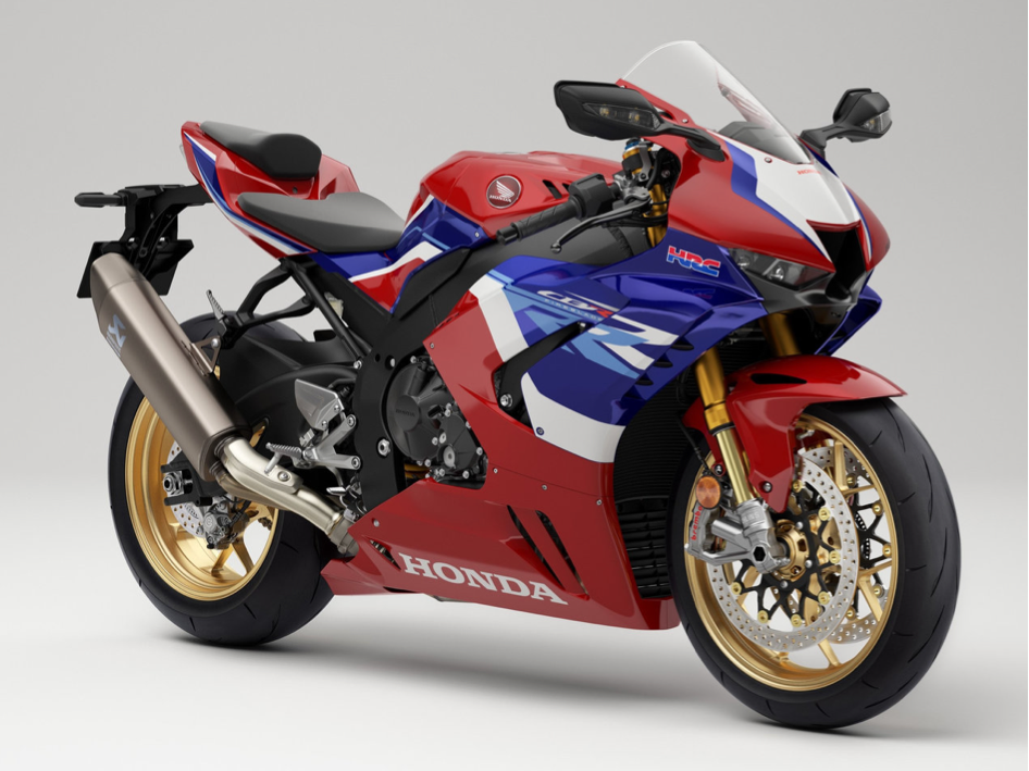 Et billede, der indeholder rød, hjelm, motorcykling
Automatisk genereret beskrivelse