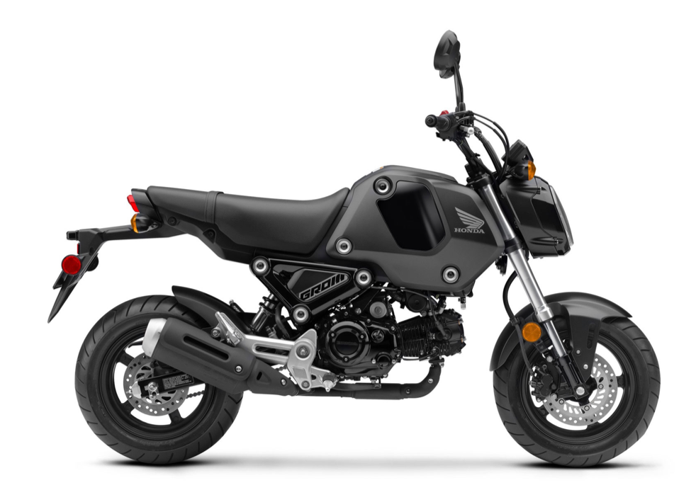 Et billede, der indeholder motorcykel, parkeret, udendørs
Automatisk genereret beskrivelse