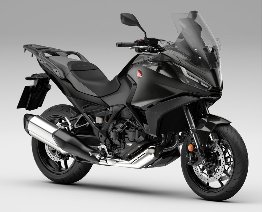 Et billede, der indeholder motorcykel, vej, udendørs, motorcykling
Automatisk genereret beskrivelse