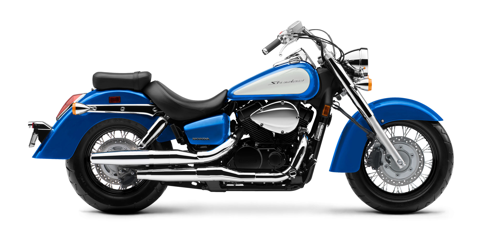 Et billede, der indeholder motorcykel, parkeret, vej, blå
Automatisk genereret beskrivelse