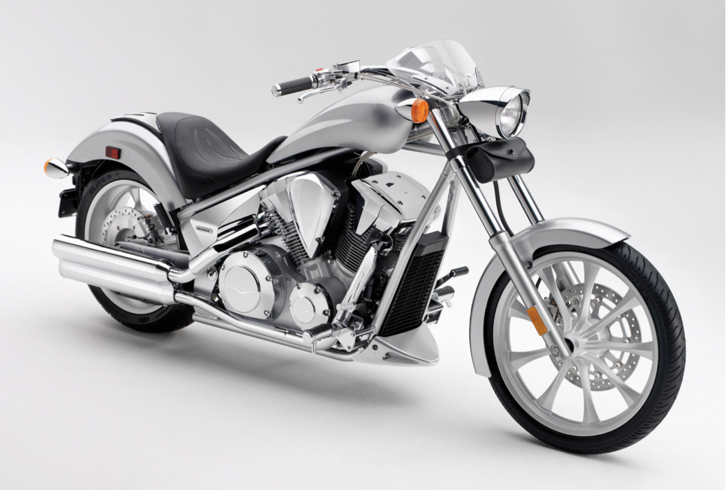 Et billede, der indeholder motorcykel, vej, udendørs, parkeret
Automatisk genereret beskrivelse