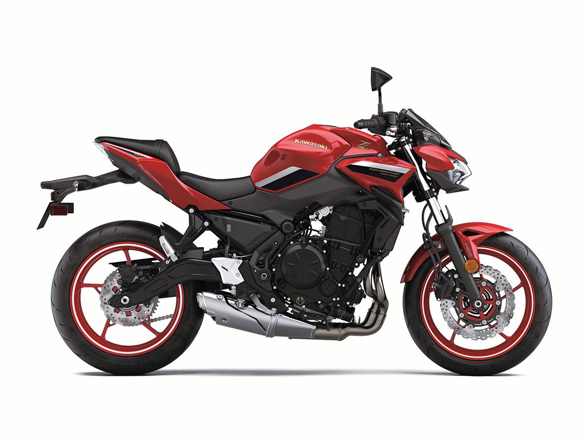 Et billede, der indeholder motorcykel, parkeret, udendørs, rød
Automatisk genereret beskrivelse