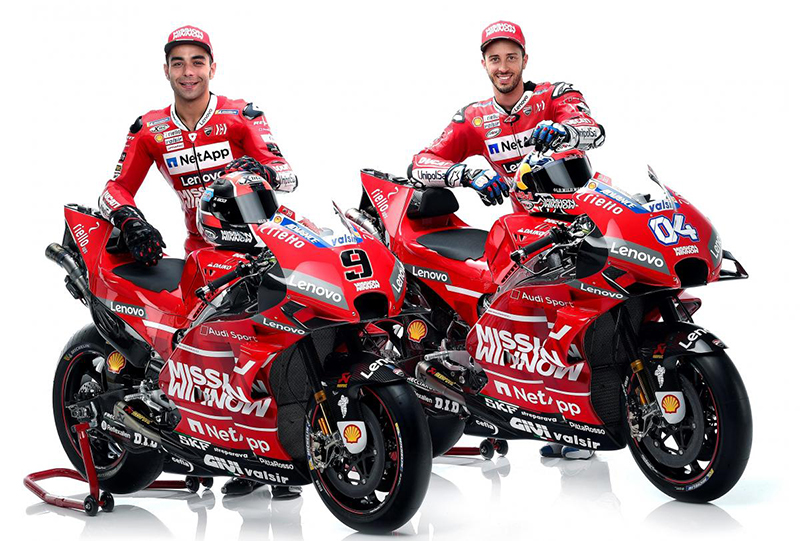 Et billede, der indeholder motorcykel, r�d, udend�rs, person

Automatisk genereret beskrivelse