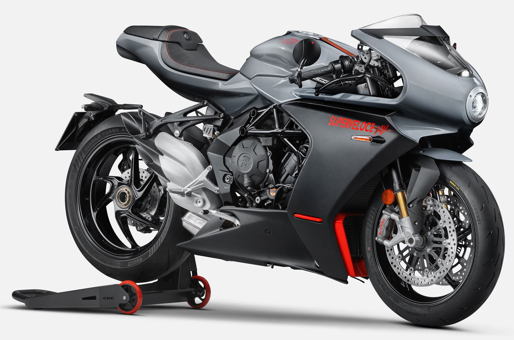 Et billede, der indeholder motorcykel, udendørs, parkeret, sølv
Automatisk genereret beskrivelse