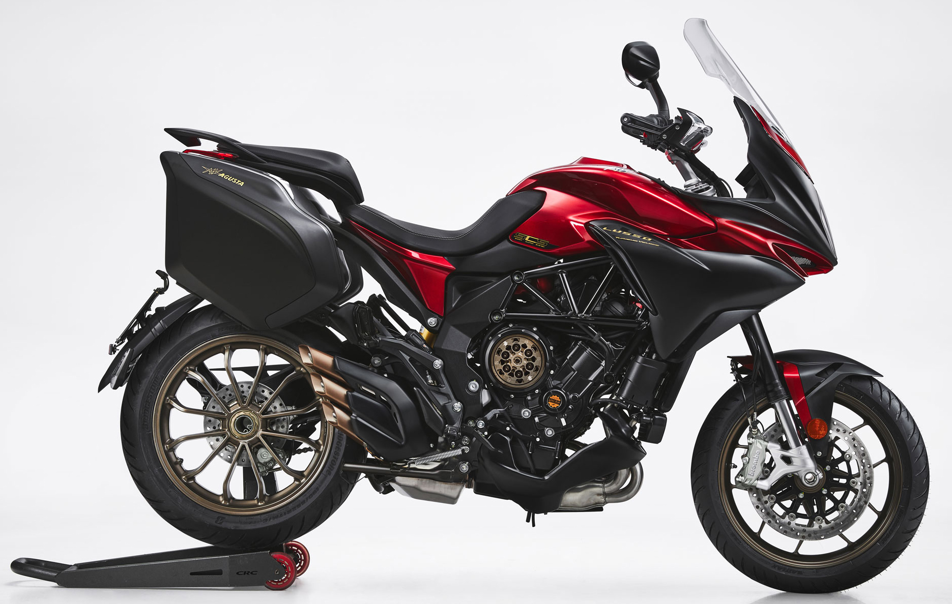 Et billede, der indeholder motorcykel, parkeret, udend�rs, r�d

Automatisk genereret beskrivelse