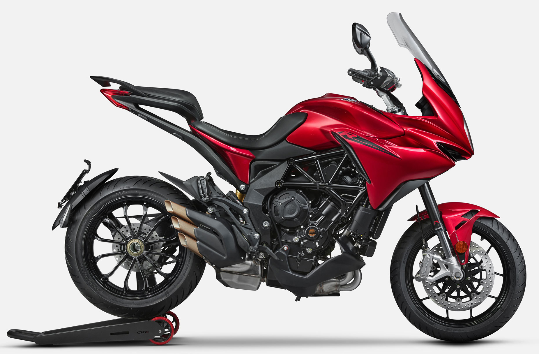 Et billede, der indeholder motorcykel, parkeret, rød, transport
Automatisk genereret beskrivelse