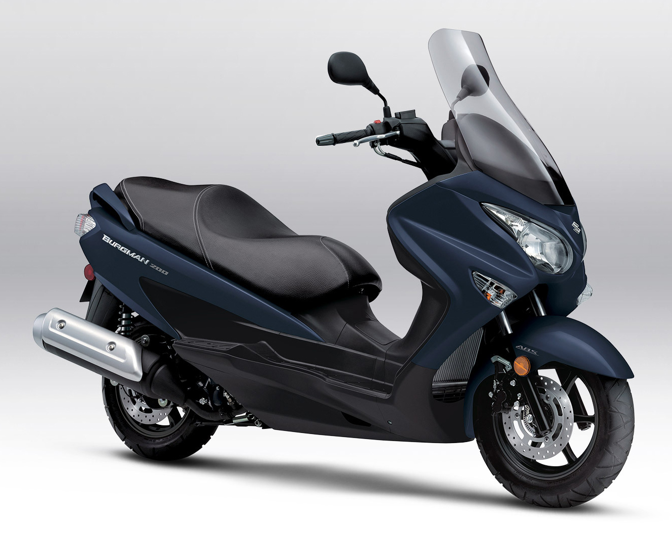 Et billede, der indeholder motorcykel, parkeret, vej, udendørs
Automatisk genereret beskrivelse