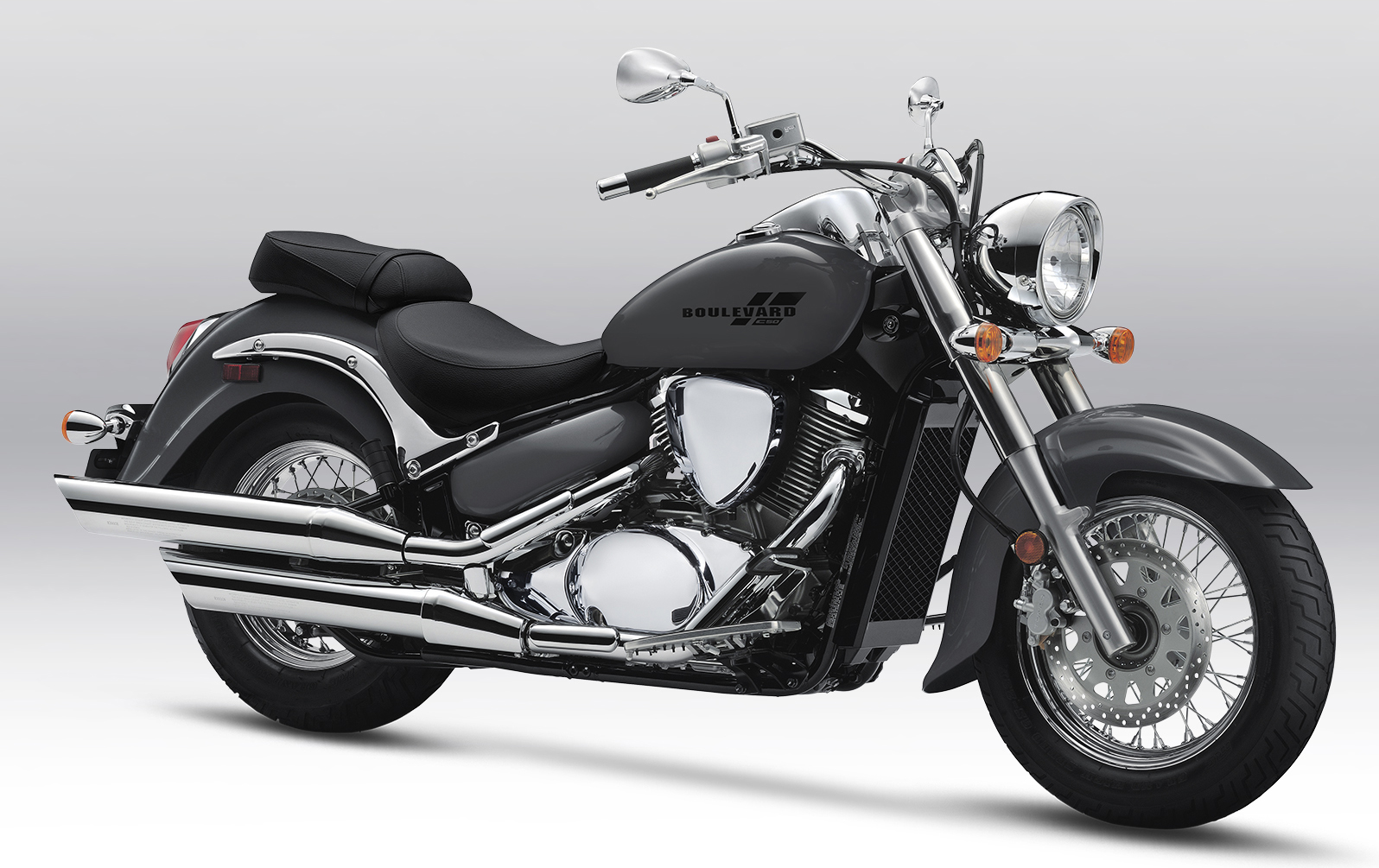 Et billede, der indeholder motorcykel, vej, udendørs, parkeret
Automatisk genereret beskrivelse