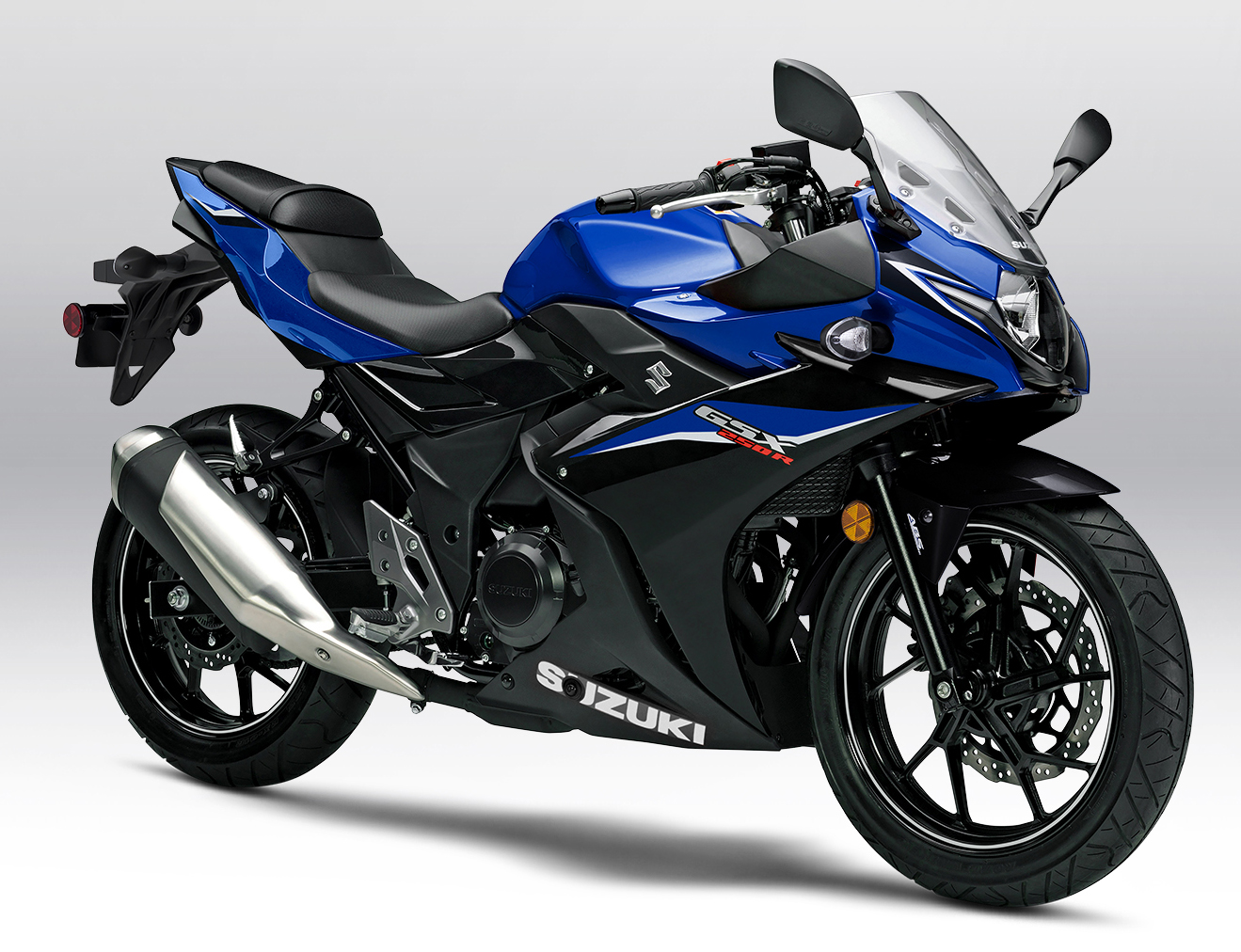 Et billede, der indeholder motorcykel, parkeret, udendørs, blå
Automatisk genereret beskrivelse