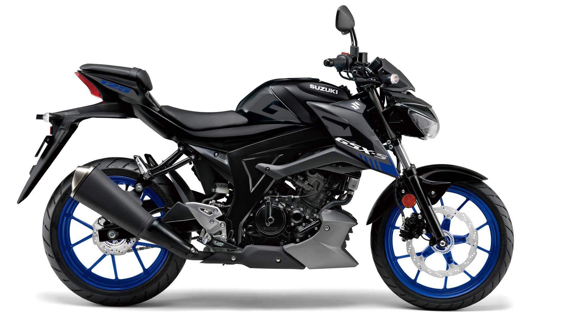 Et billede, der indeholder motorcykel, parkeret, udendørs, sølv
Automatisk genereret beskrivelse