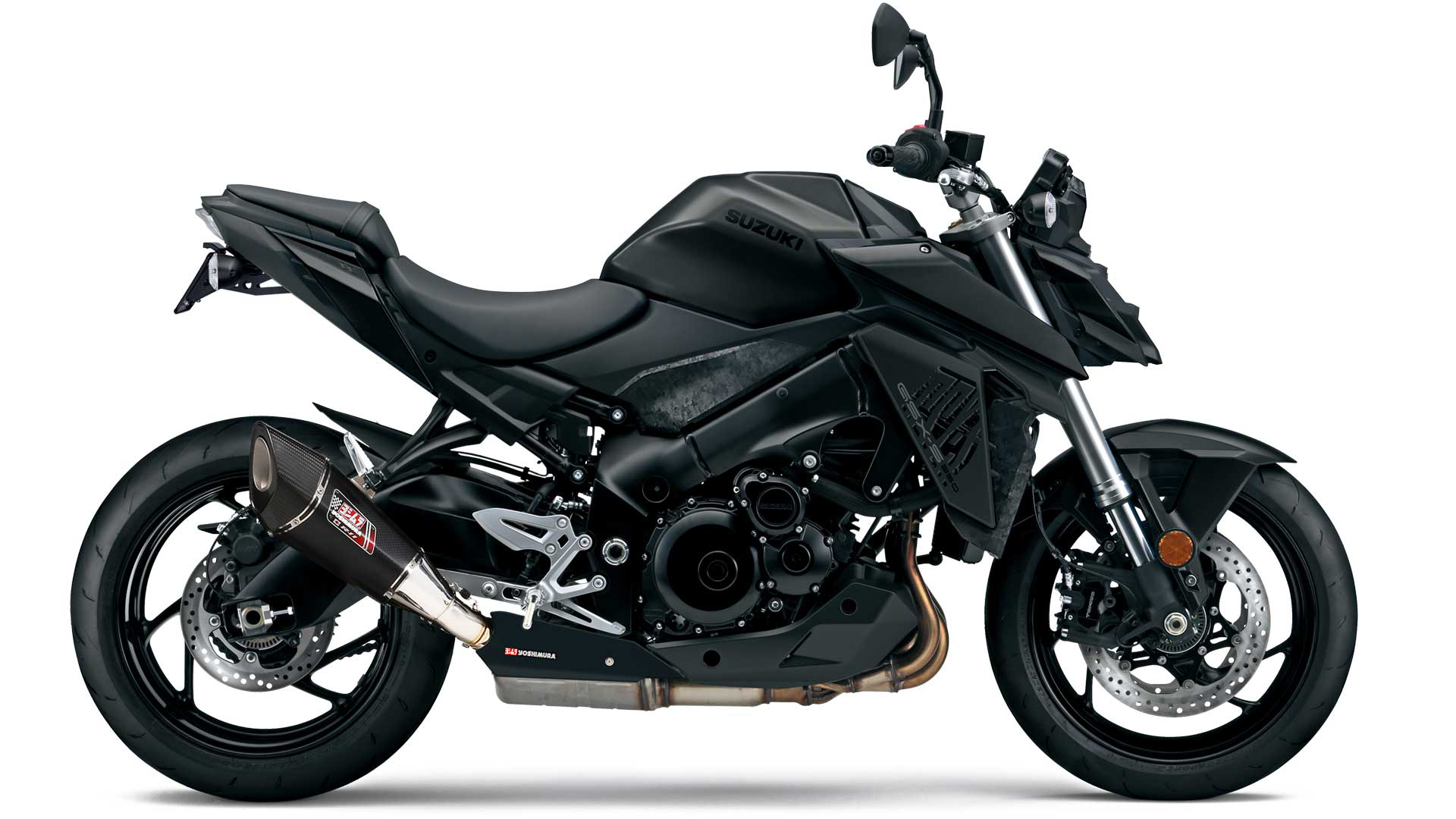 Et billede, der indeholder motorcykel, parkeret, udendørs, sort
Automatisk genereret beskrivelse