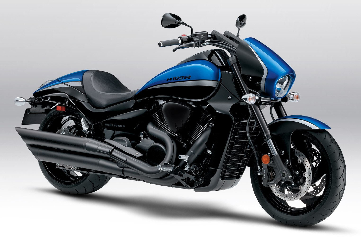 Et billede, der indeholder motorcykel, vej, udendørs, parkeret
Automatisk genereret beskrivelse