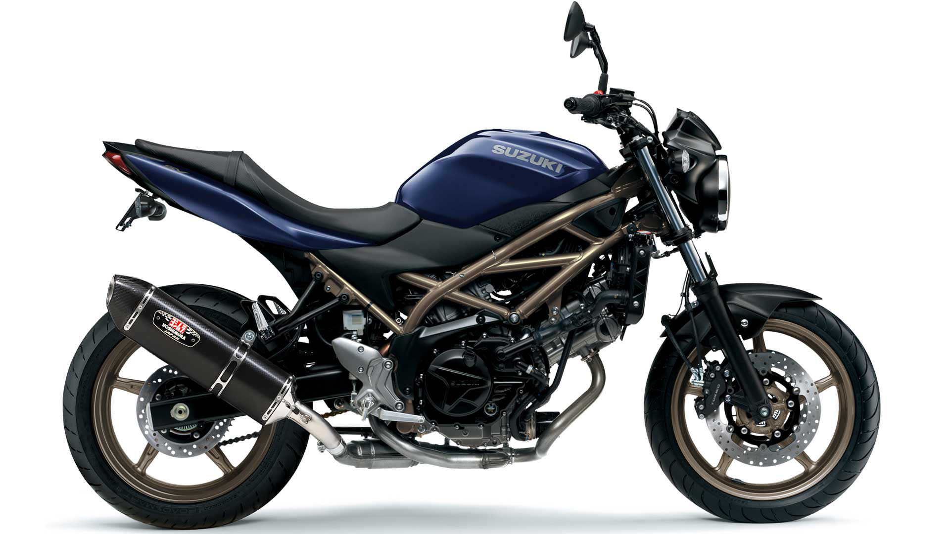 Et billede, der indeholder motorcykel, parkeret, udendørs, sølv
Automatisk genereret beskrivelse